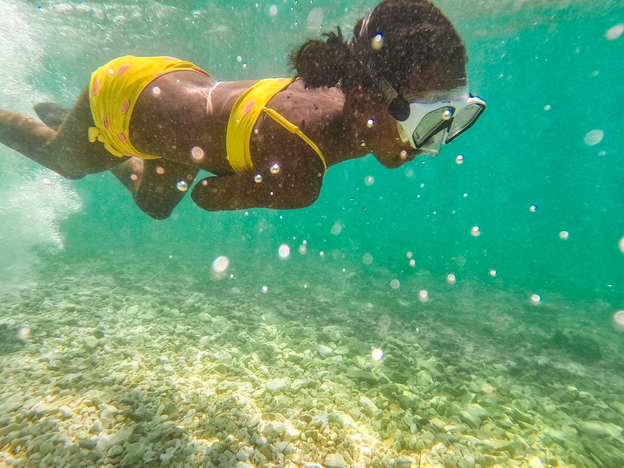 young woman scuba diving
